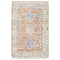 Hand-loomed Malabar traditional rug with Persian designs in orange, blue, and warm clay tones.