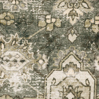 Close-up of Malibu Blue & Beige washable polyester rug with distressed traditional pattern.