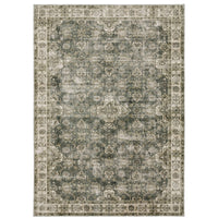 Malibu Blue & Beige Washable Rug with distressed floral pattern and ornate border.