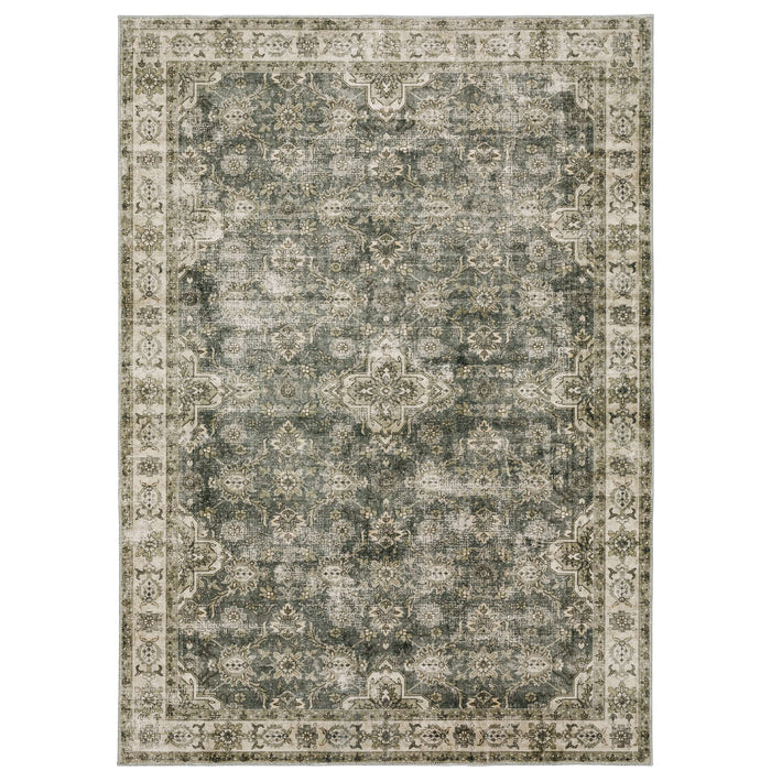 Malibu Blue & Beige Washable Rug with distressed floral pattern and ornate border.