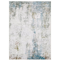 Malibu Ivory & Blue Washable Rug with distressed abstract design and non-slip backing.
