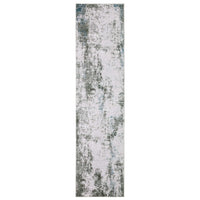 Malibu Ivory & Grey washable polyester rug with distressed abstract design and non-slip backing.