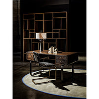 Malic Dark Walnut Bookshelf, 88"H, with varied cubbies behind a dark wood desk and chair.