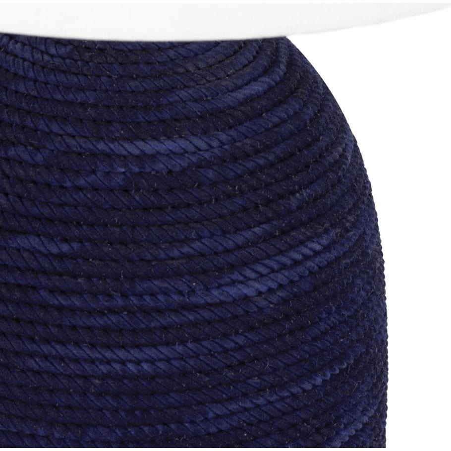 Manuka Table Lamp with a hand-wrapped indigo rope base and a white linen shade, showcasing coastal style.
