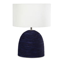 Manuka Table Lamp with a hand-wrapped indigo rope base and a white linen drum shade.