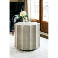Marilyn Ivory Shagreen Scalloped Accent Table with faux shagreen covering, modern shape, and casters.