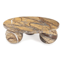 Marlow brown marble plate with a round top and two spherical legs, showcasing natural veining.