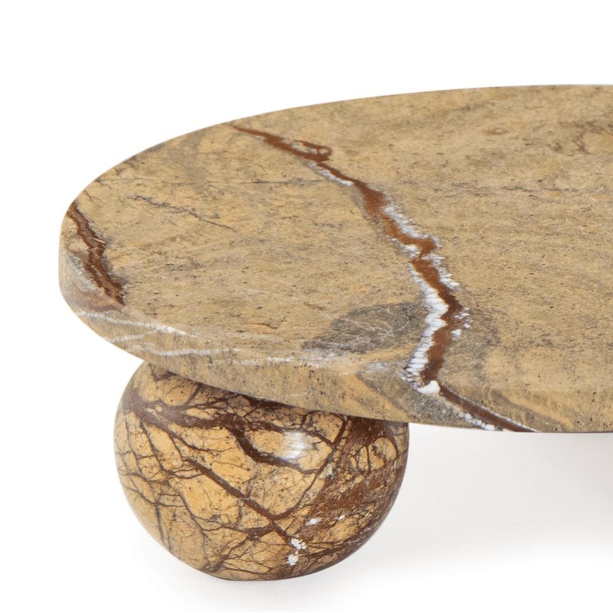 Marlow brown marble plate with natural veining, featuring a round top and spherical base.