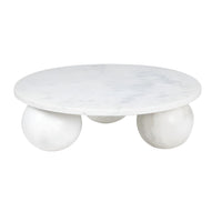 Round white marble plate with three spherical feet, 9" wide.