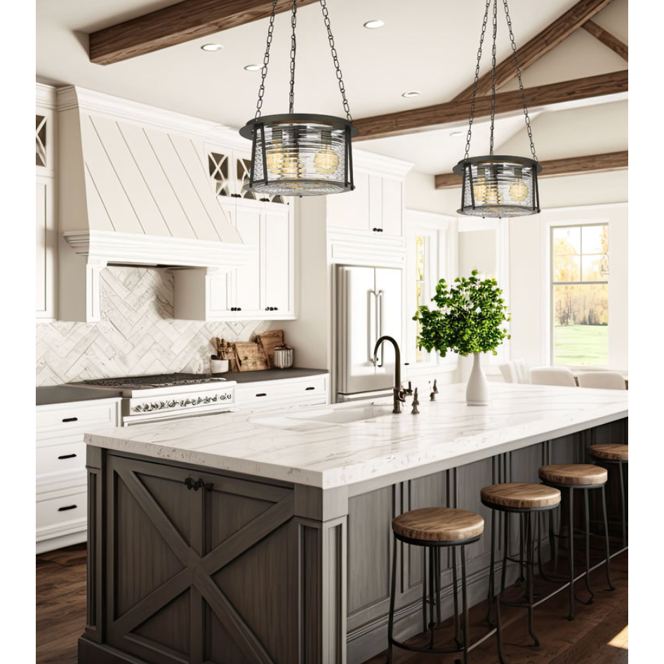 Modern kitchen with marble island, pendant lights, and wooden stools.