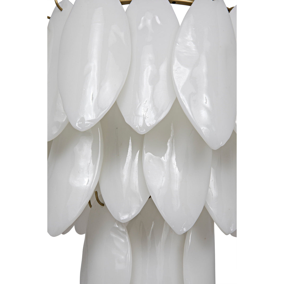 Modern tiered chandelier with white milk glass petals and antique brass accents.