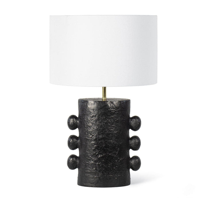 Black Maya Metal Table Lamp with a textured, sculptural base and a white linen shade.