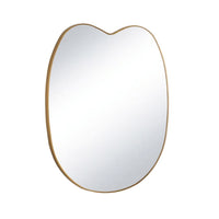 Mela Metal Mirror with a natural brass steel frame and unique organic silhouette.