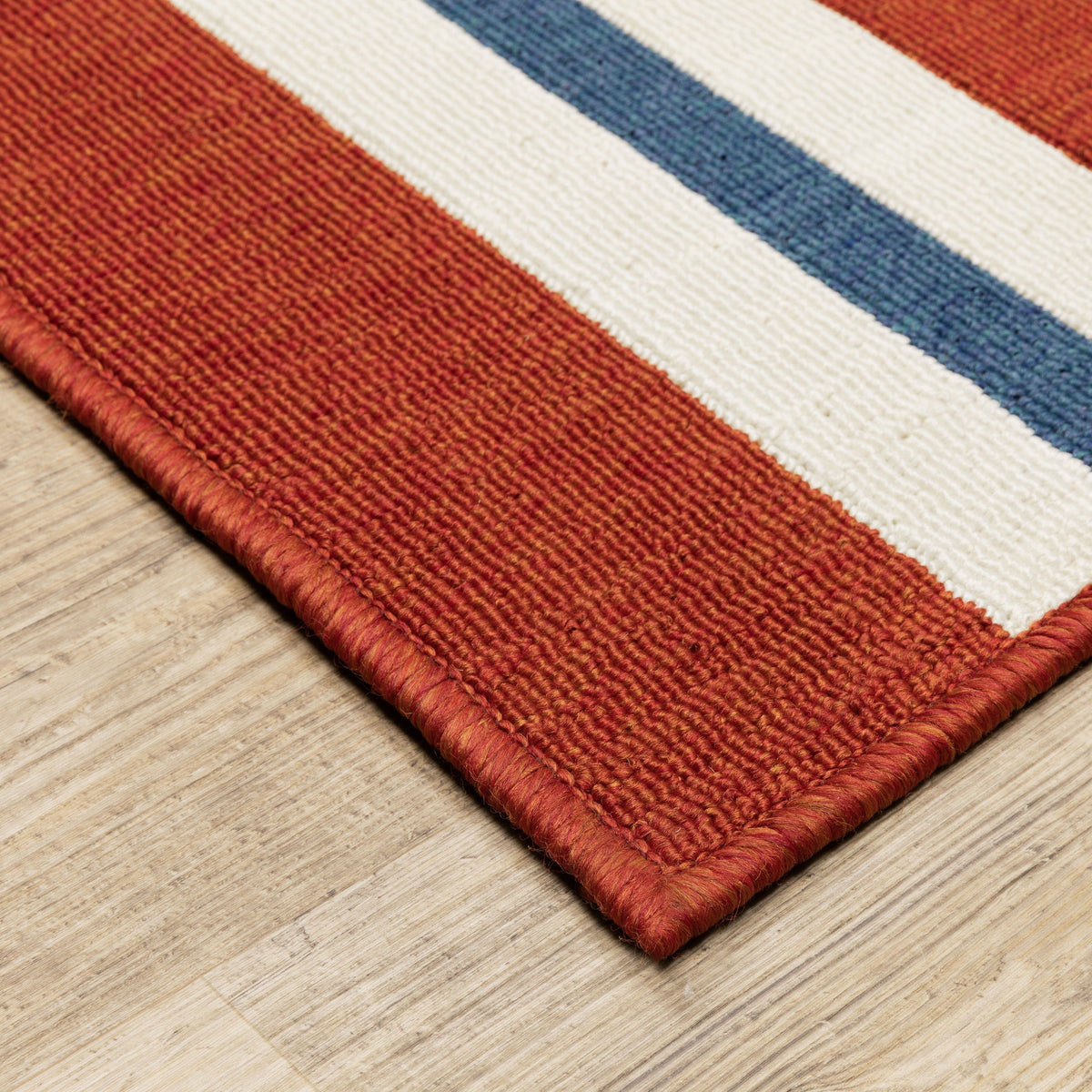 Meridian Red & Blue Outdoor Rug with bold stripes and durable polypropylene weave.