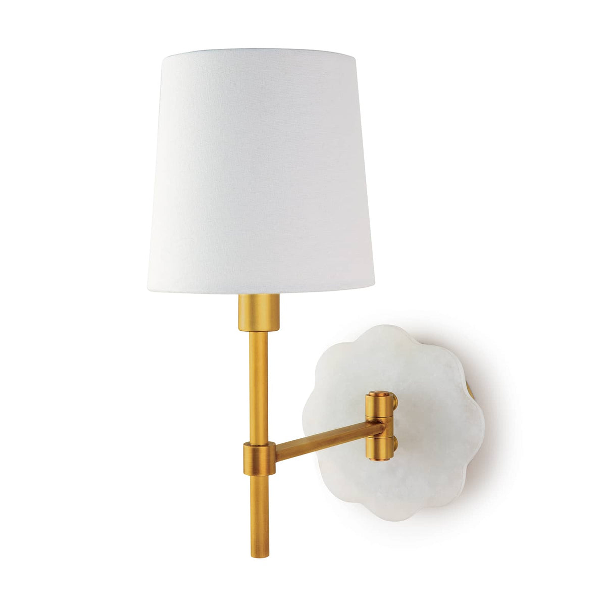 Mia swing arm sconce with a scalloped alabaster backplate, natural brass arm, and white linen shade.