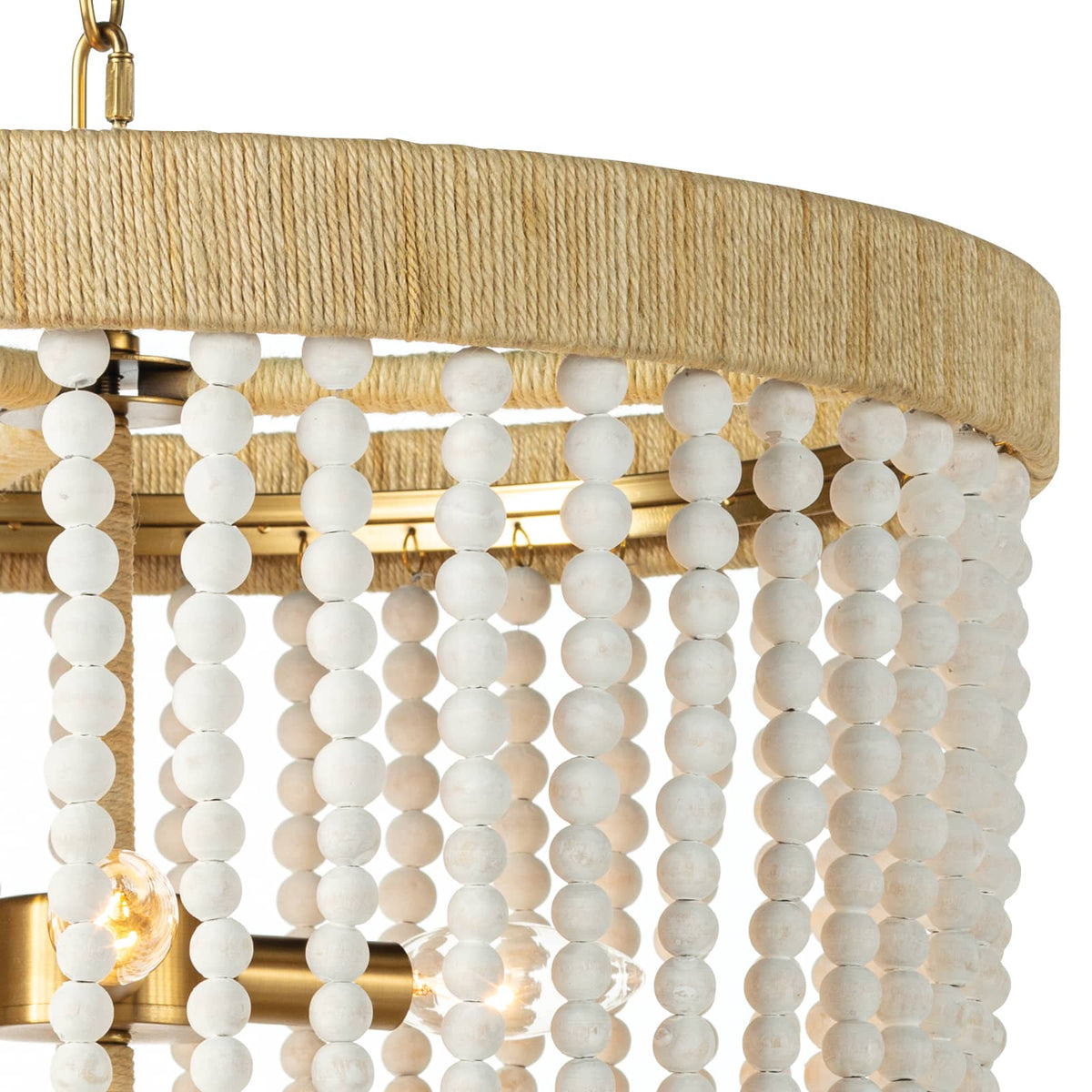 Milos white beaded chandelier with a jute-wrapped frame and three candelabra bulbs.
