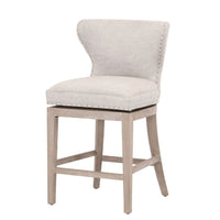 Milton Bisque French Linen swivel counter stool with transitional design, light wood base, and nailhead trim.