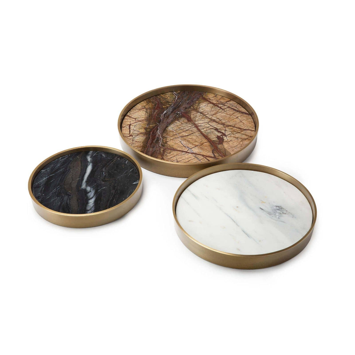 Set of three round marble trays in black, brown, and white, each with a natural brass frame.