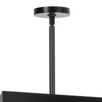 Montecito Black Outdoor Lantern with a bold charcoal frame and frosted glass, Spanish Colonial style.