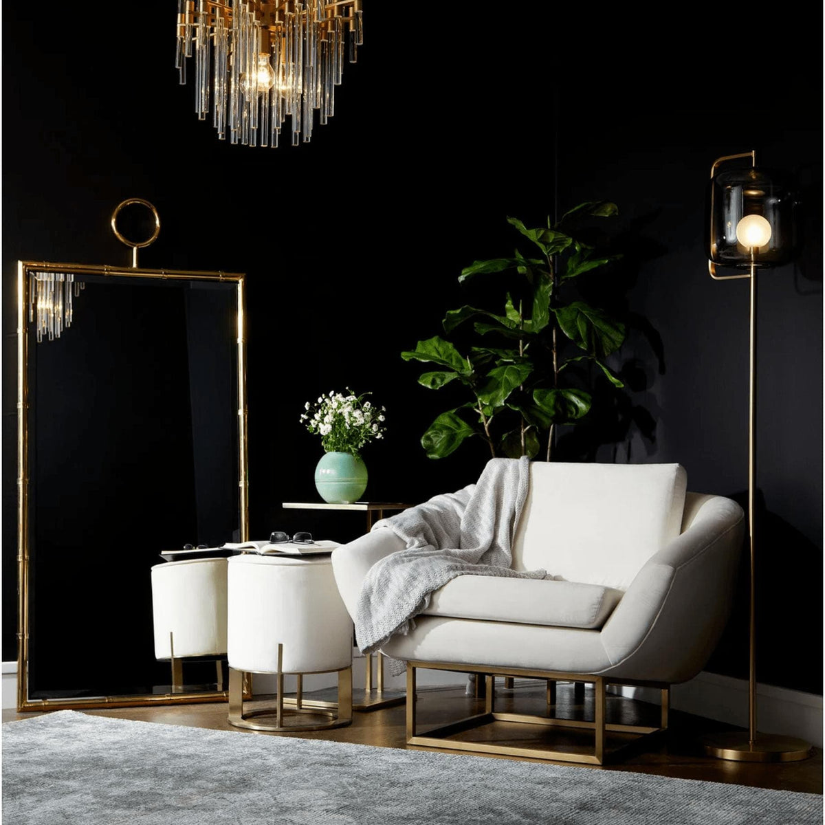 Large Montreal aged brass and glass chandelier with linear glass rods, illuminating a modern living space.