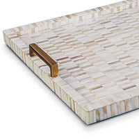 Multi-tone bone and brass tray with a mosaic pattern and natural brass handles.