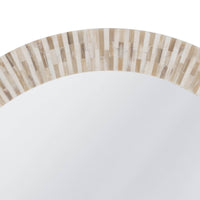 Round multitone bone tile mirror with slender, handcrafted striping.