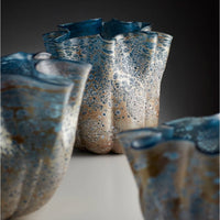 Three Muse Blue Art Glass decorative bowls with soft folds and textured blue, white, and earth-toned finish.