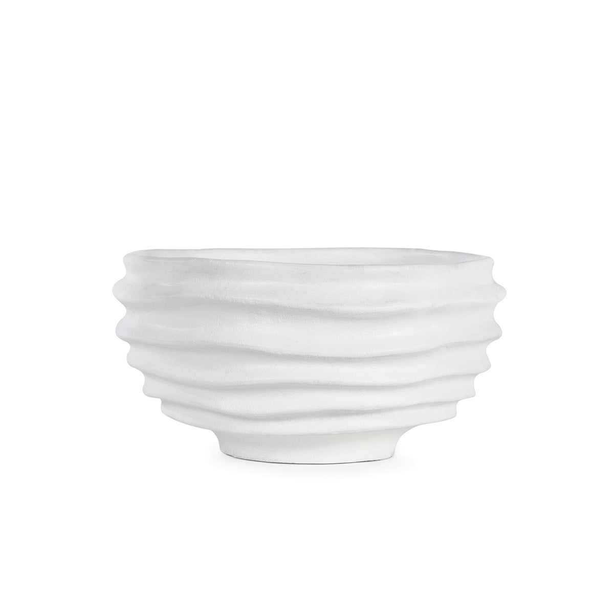 White sculpted metal Nabu bowl with irregular groove pattern and plaster-like finish.