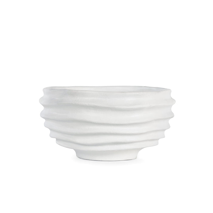 White sculpted metal Nabu bowl with irregular groove pattern and plaster-like finish.