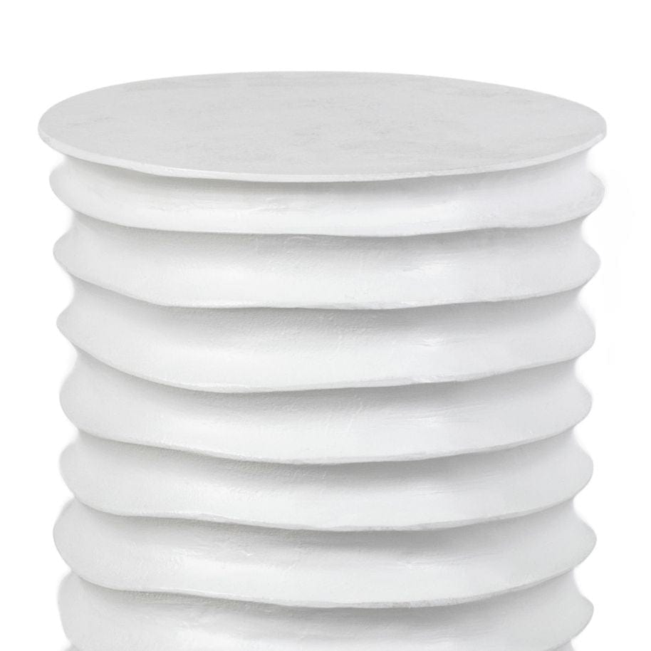 White Nabu Metal Table, drum-shaped aluminum with accordion-like texture and finger grooves.