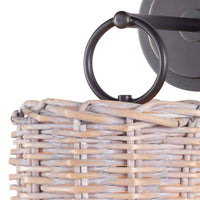 Nantucket sconce with a handwoven rattan basket shade and an oil-rubbed bronze backplate.