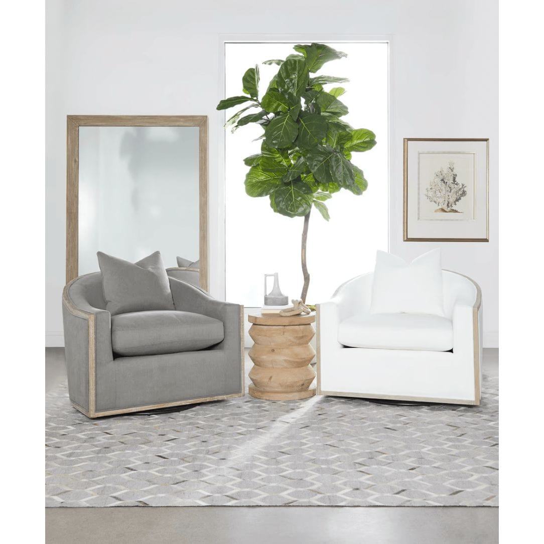 Natural gray acacia bevelled floor mirror, 79"H x 47"W, with two armchairs and a plant.
