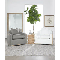 Natural gray acacia bevelled floor mirror, 79"H x 47"W, with two armchairs and a plant.