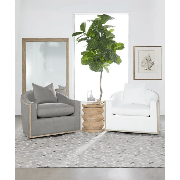 Natural gray acacia bevelled floor mirror, 79"H x 47"W, with two armchairs and a plant.