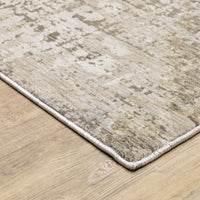Nebulous Beige Abstract Contemporary Rug, a low-profile polyester rug with a modern abstract pattern in neutral shades.