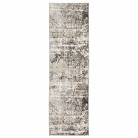 Long contemporary rug with abstract beige, ivory, and black patterns on soft polyester.