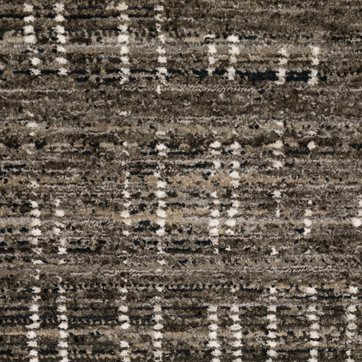 Close-up of a Nebulous Charcoal & Grey Casual Rug with a modern abstract pattern and soft polyester yarns.
