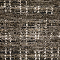 Close-up of a Nebulous Charcoal & Grey Casual Rug with a modern abstract pattern and soft polyester yarns.