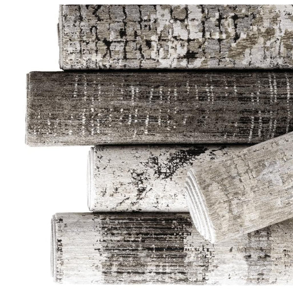 Rolled Nebulous Ivory Abstract Casual Rugs in neutral charcoal and ivory, featuring textured polyester with modern patterns.