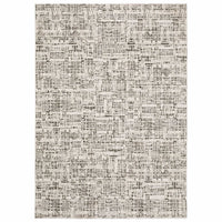 Nebulous Ivory Abstract Casual Rug with modern charcoal and ivory patterns, made from soft polyester yarns.