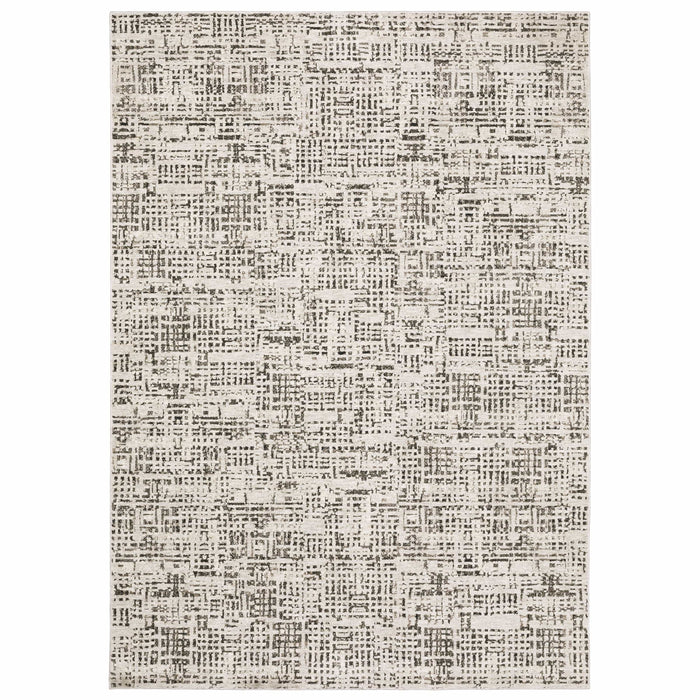 Nebulous Ivory Abstract Casual Rug with modern charcoal and ivory patterns, made from soft polyester yarns.