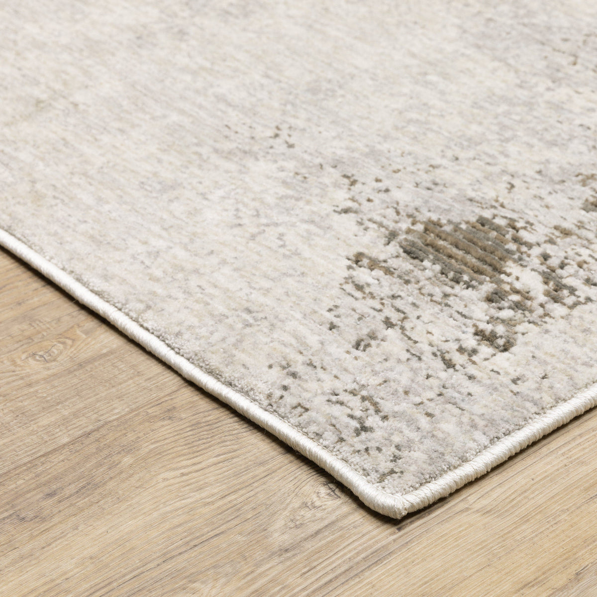 Nebulous Ivory & Beige Contemporary Rug, low-profile polyester with modern abstract patterns on wood floor.