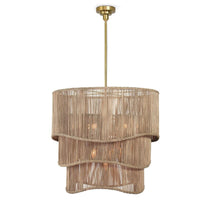 Nimes Rattan Chandelier with three tiered natural woven drum shades and a natural brass finish.