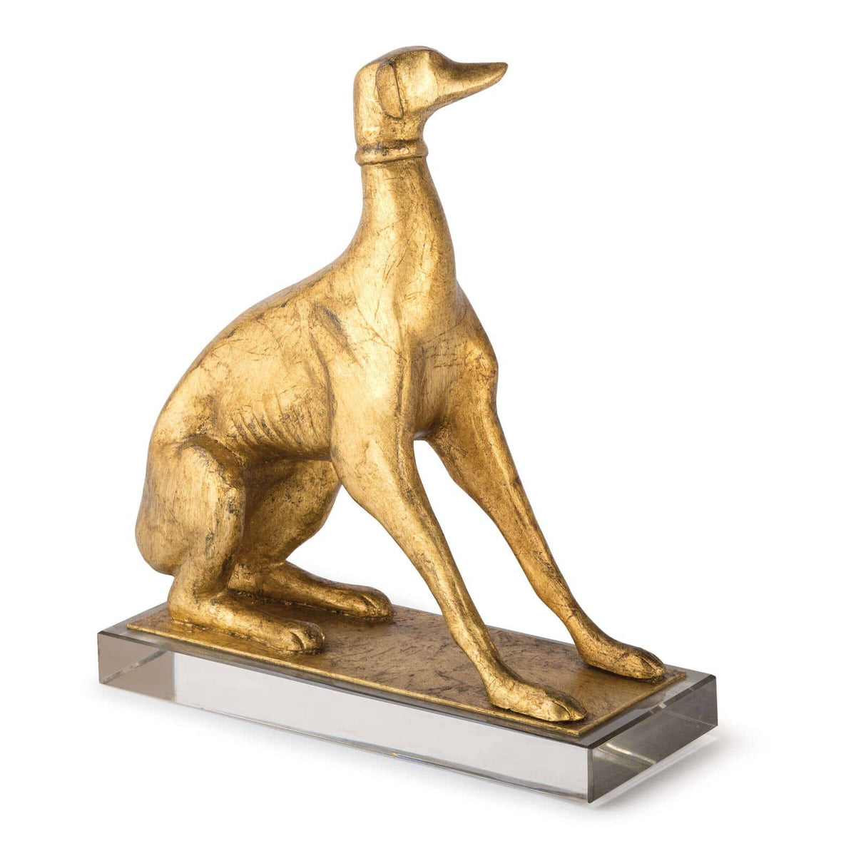 Antiqued gold leaf dog bookend on a clear crystal pedestal.