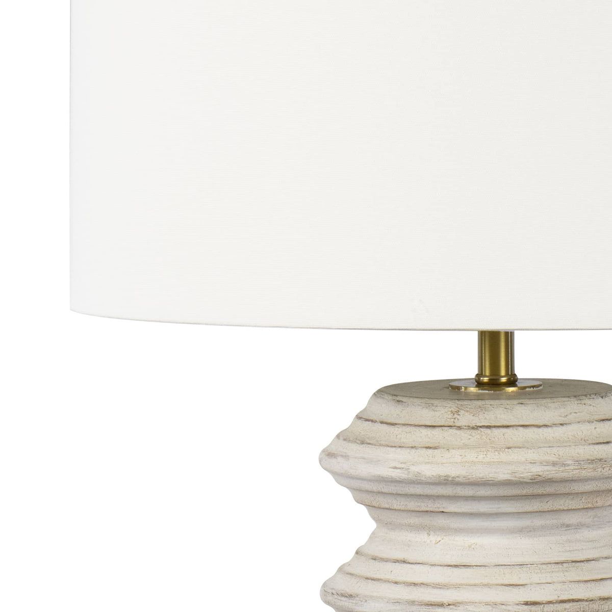 Nova Wood Table Lamp with white-washed carved wood body, natural linen drum shade, and brass finial.