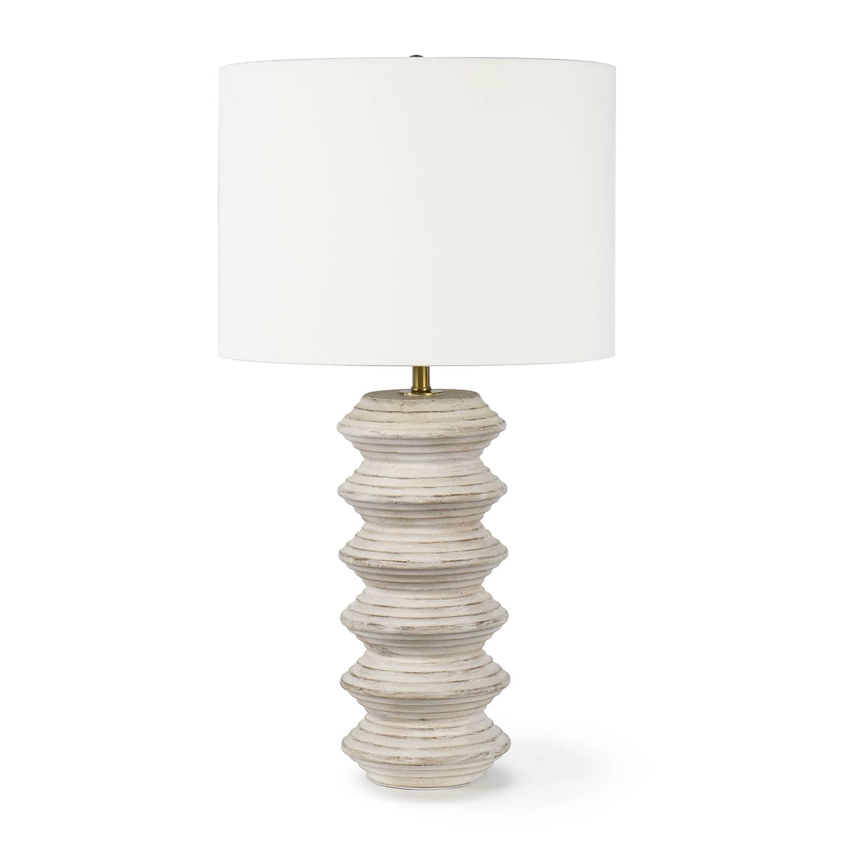 Nova Wood Table Lamp with white-washed carved wood body, natural linen drum shade, and brass finial.