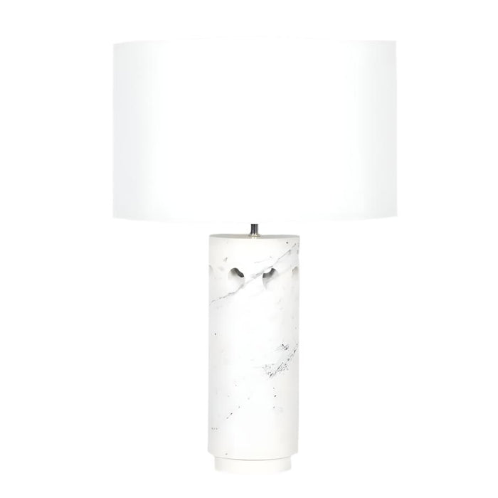 Odin modern white marble table lamp with purple veining, angled apertures, and a white linen shade.