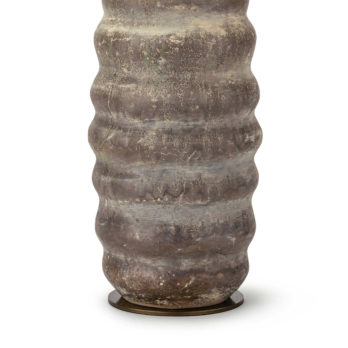 Ola ceramic table lamp base with an organic, wavy texture and matte earthen brown glaze on an aged brass disc.