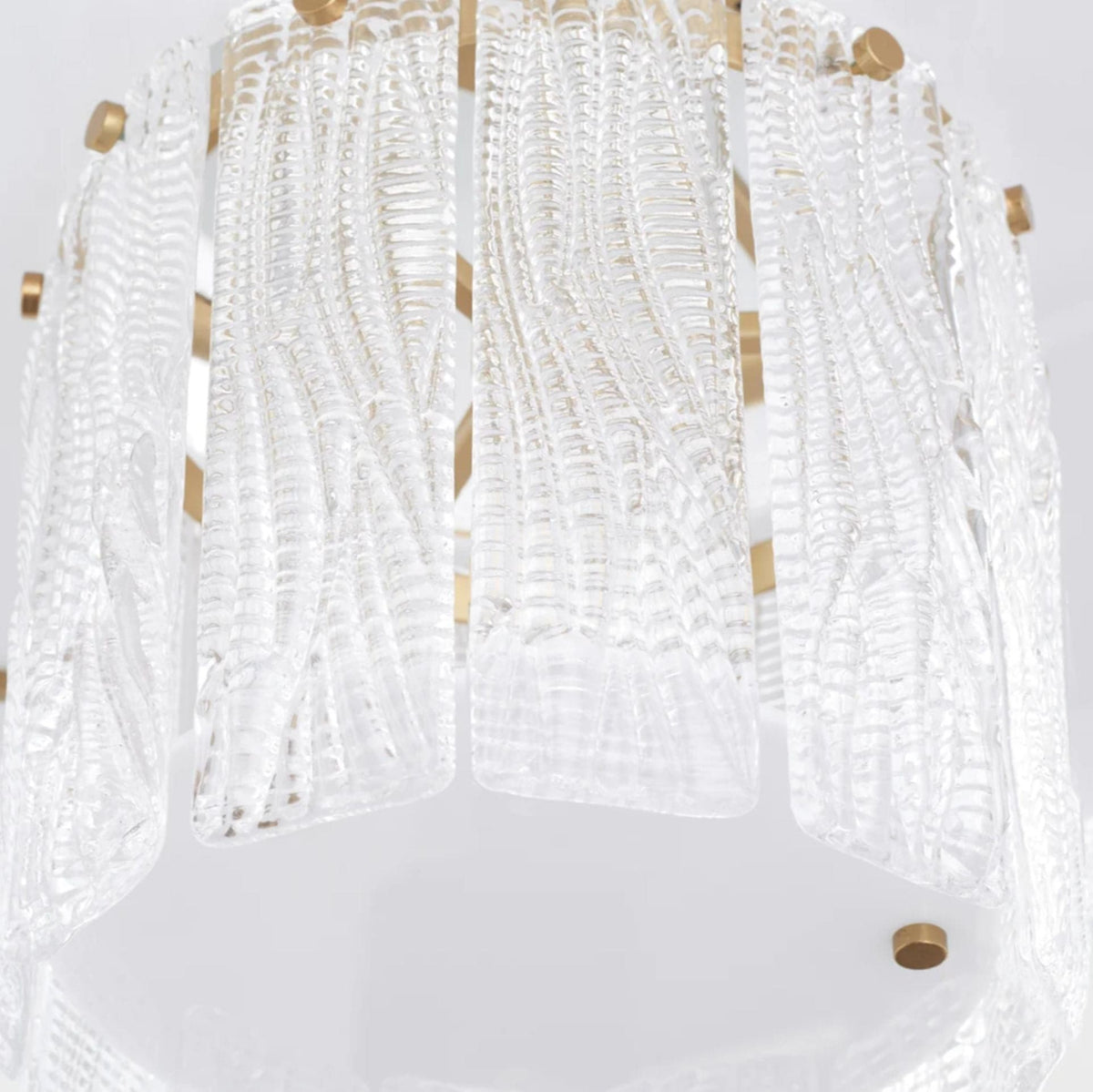 Orinder Aged Brass Semi-Flush Mount Light with hand-pressed textured clear glass panels and aged brass frame.