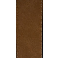 Close-up of brown leather with white stitching, a detail from the Oryan chair.